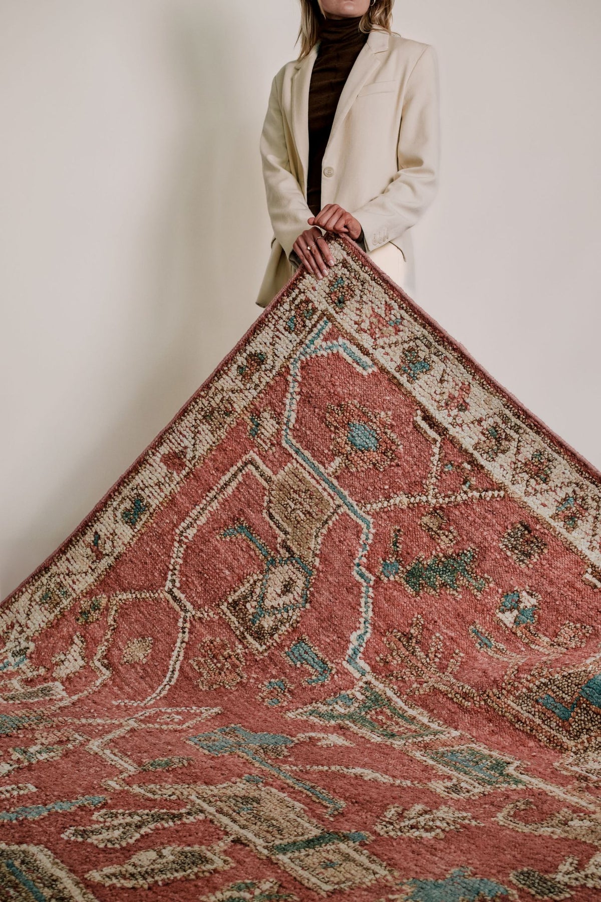 location of the Biri rug from the Oushak Collection, featuring a red, cream and muted blue traditional pattern.