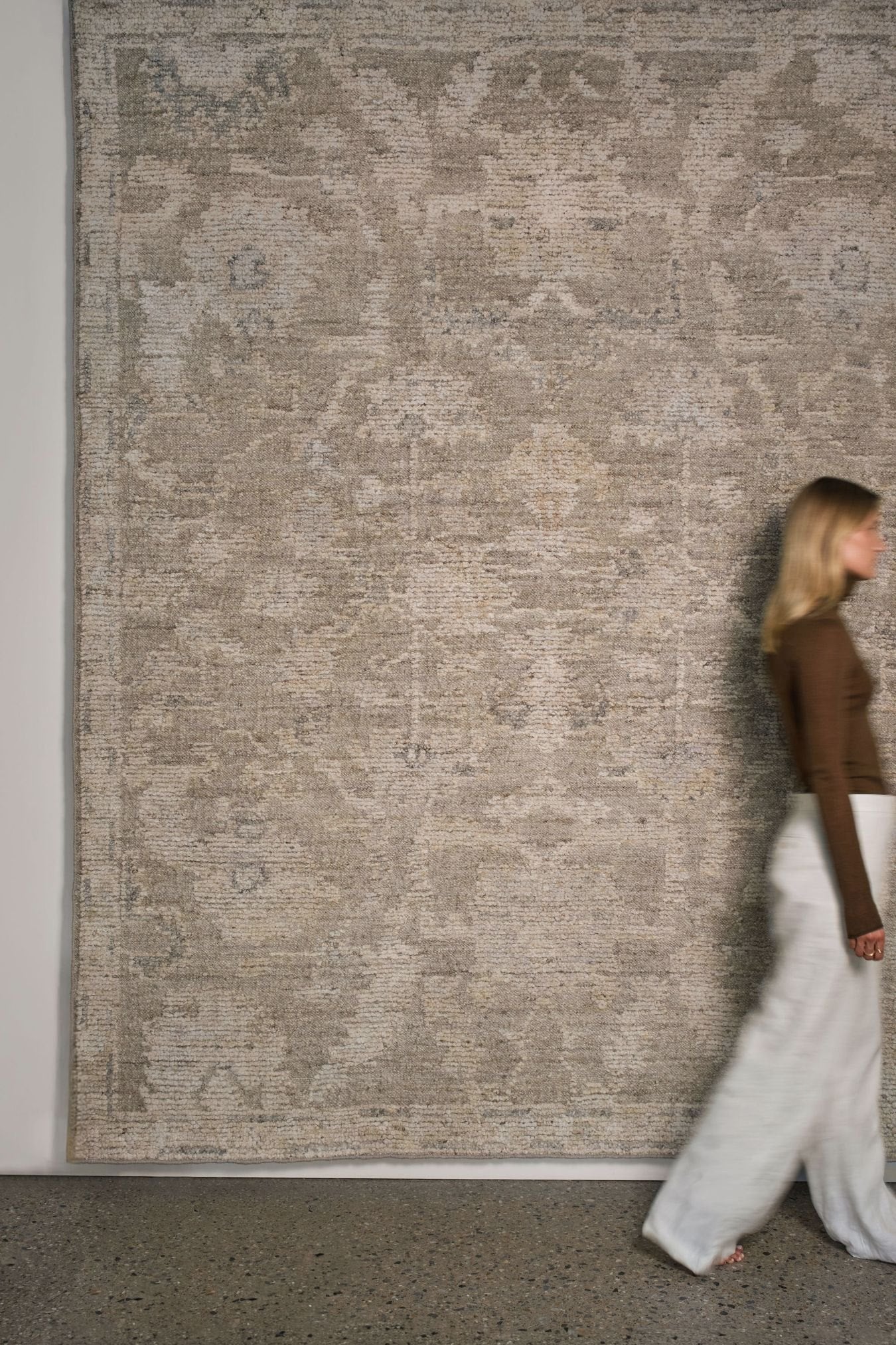 location image of the Olarak rug from the Oushak Collection, featuring a textured taupe, grey and cream pattern.