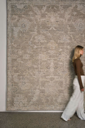 location image of the Olarak rug from the Oushak Collection, featuring a textured taupe, grey and cream pattern.