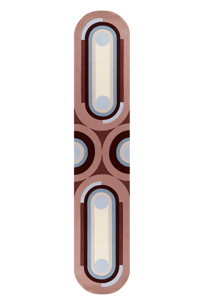 A modern, minimalist vertical rectangular rug with rounded ends, featuring a mid-century geometric pattern of cream, light blue, dark brown, and dusty rose on a white background.