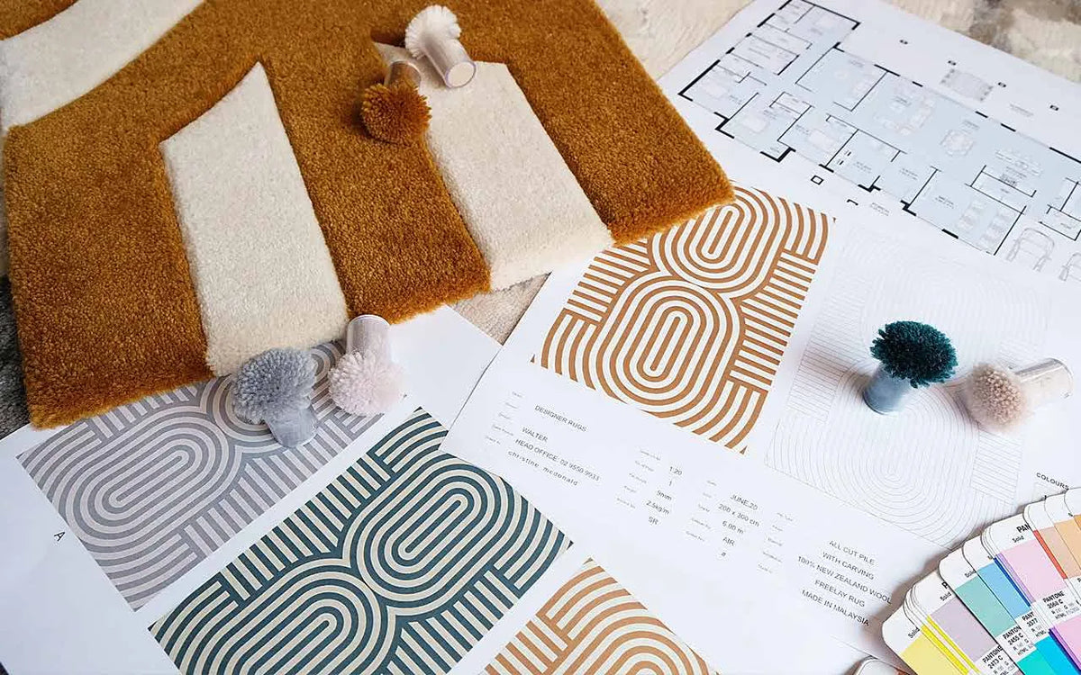 An in-house rug design alongside a floor plan
