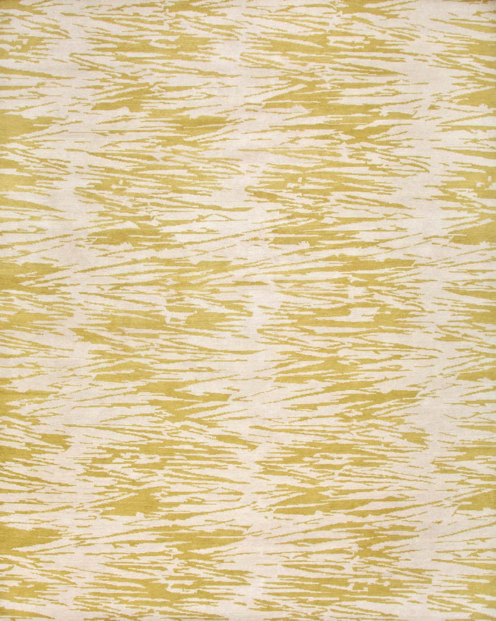 overhead of straw rug by anna carin in beige organic pattern