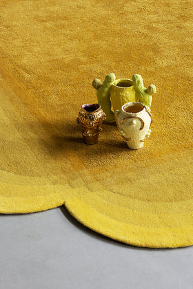 Close up image of Meadow Rug with yellow gradien