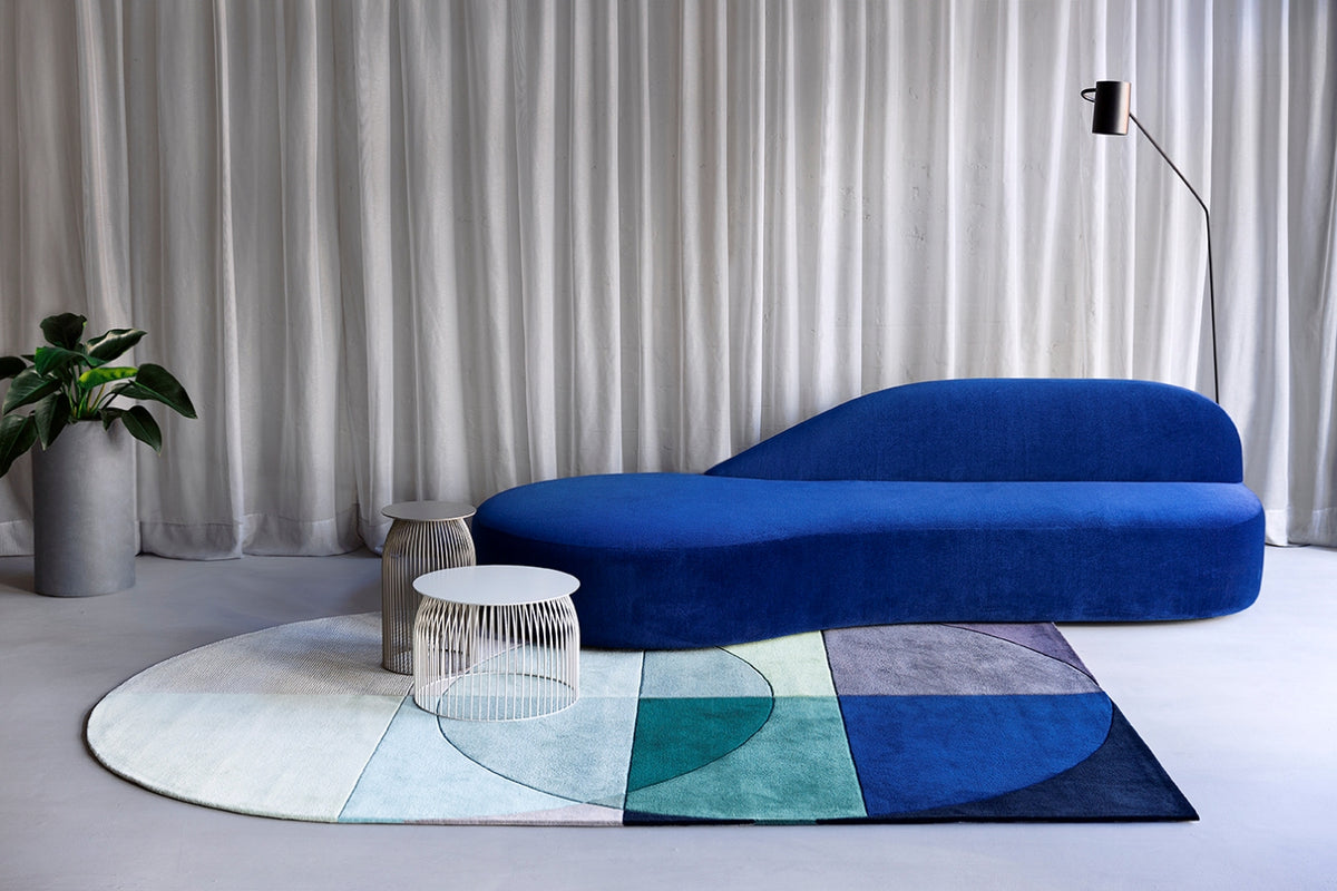 location living room shot of ocean rug by bernabeifreeman blue green