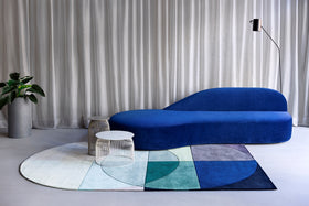 location living room shot of ocean rug by bernabeifreeman blue green