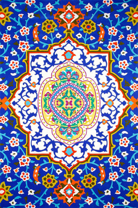 overhead of formentera rug by camilla blue background symmetrical floral