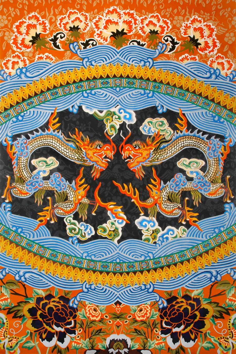 A close-up of a colorful traditional textile or artwork featuring two dragons facing each other within a circular border, surrounded by blue waves, floral motifs, and orange background details.