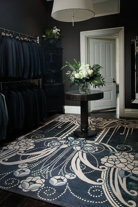 location wardrobe shot of black pearl rug by catherine martin art deco style