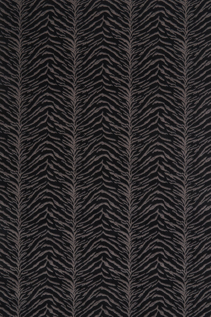 Overhead image of tiger print Tigre carpet in black