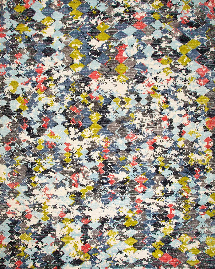 A close-up of a multicolor distressed geometric pattern with a diamond lattice design in shades of blue, gray, white, yellow, red, and black.