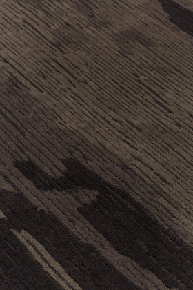 close up image of the Rhodium dark grey rug