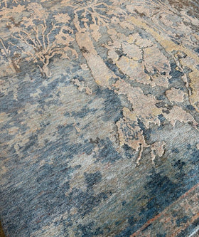 close up image of Seville handknot rug in blue and yellow colour