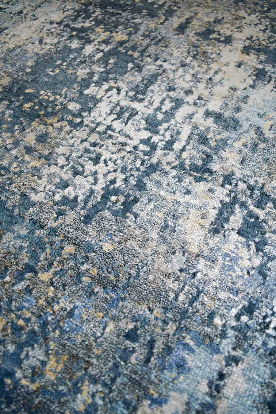 Detailed image of distressed Lamancha rug in navy blue colour