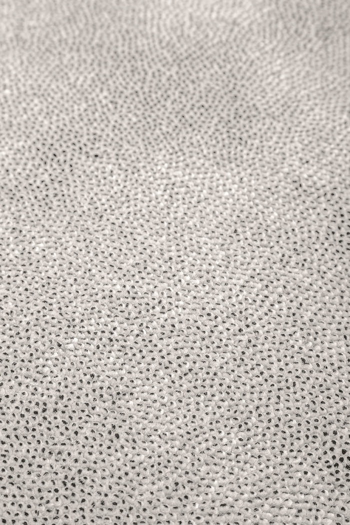 Detailed view of textured Coral Cut Pile rug in beige colour