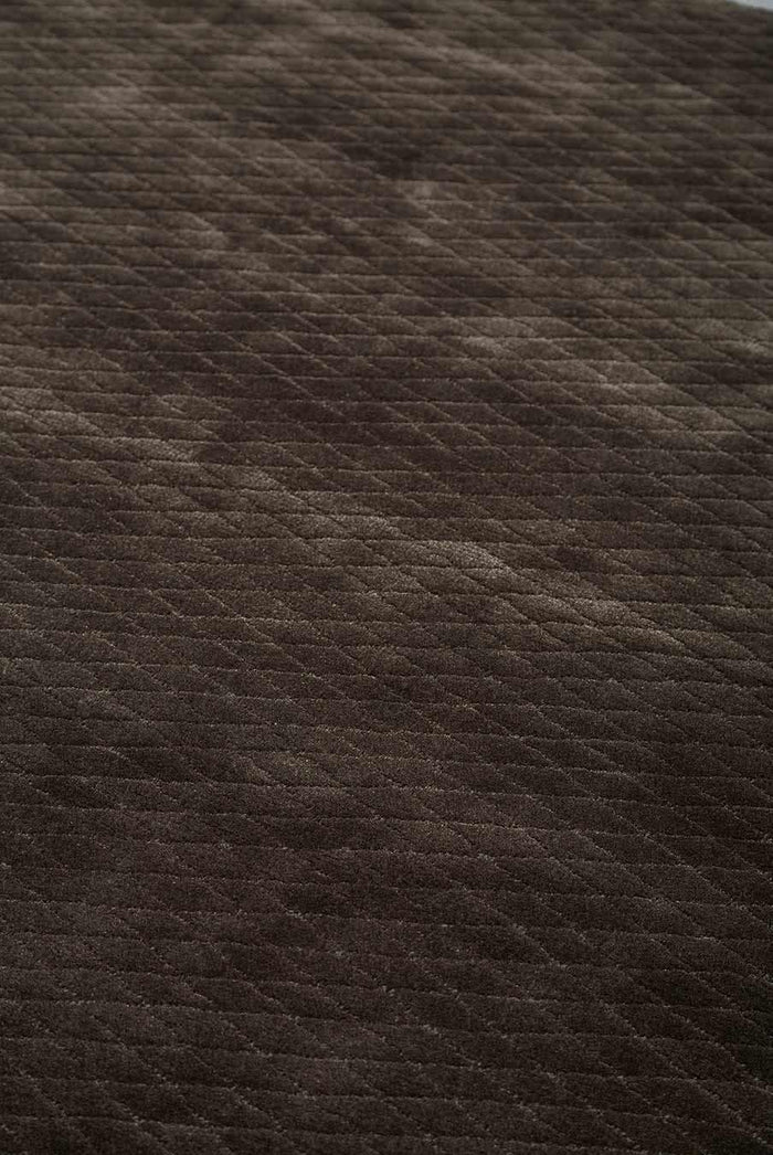 Close up view of textured Diamond Velour rug in dark brown colour