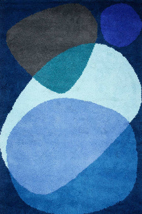 overhead of luna eclipse rug by dinosaur designs large blue shapes