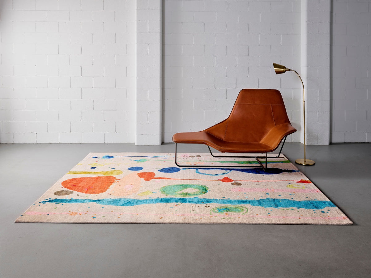 Living room image of painterly Dream Garden rug by Louise Olsen
