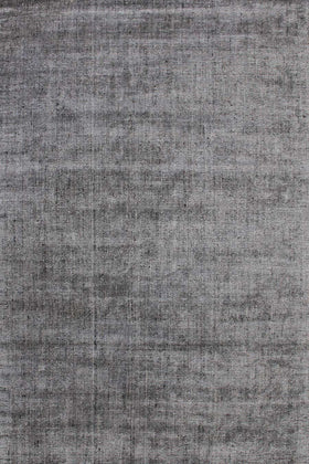 Overhead image of textured Gomez rug in dark grey colour