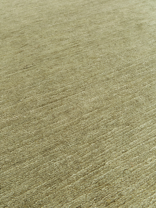 close up image of the Esperance handknot rug in sage green.