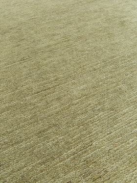 close up image of the Esperance handknot rug in sage green.