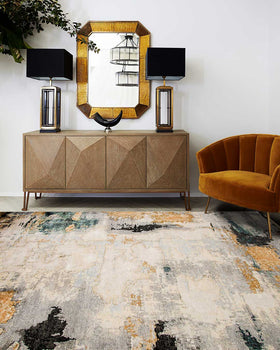 Living room image of distressed Glory Days handknot rug in gold and green