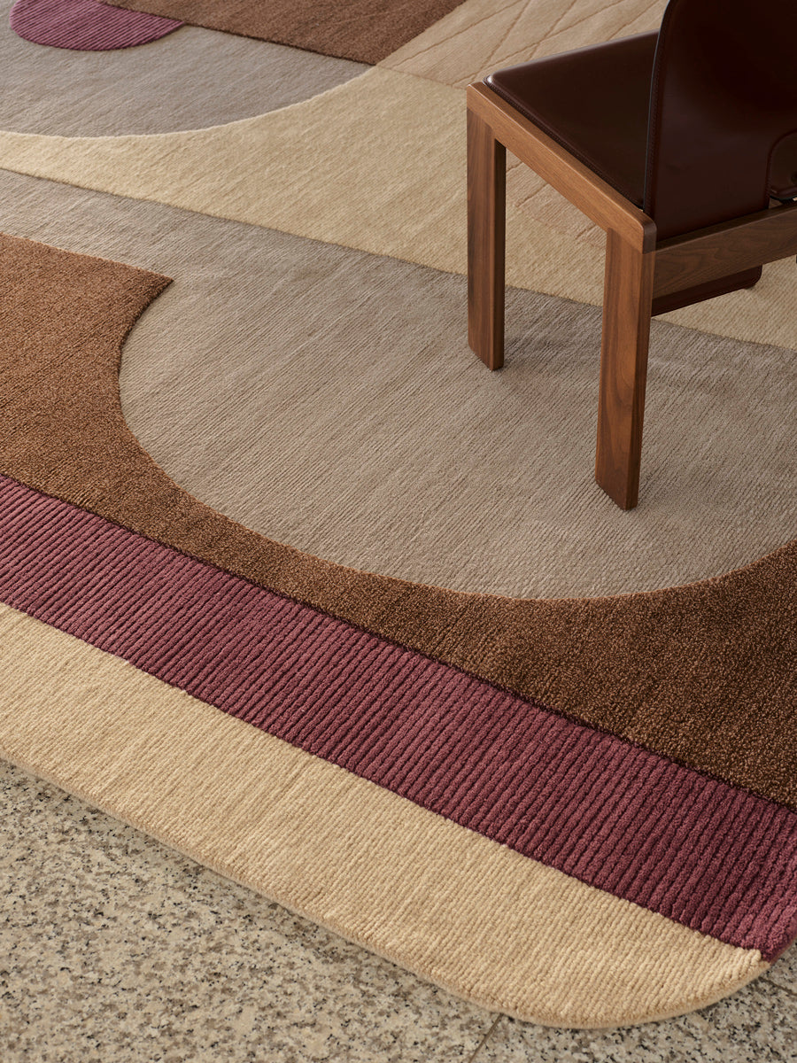 Rozzo wool handknot rug by Greg Natale styled in a modern interior – luxury designer rug with tonal geometric pattern, handknotted in wool for texture, depth, and durability