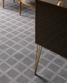 Close up view of Match grey geometric Axminster carpet by Greg Natale