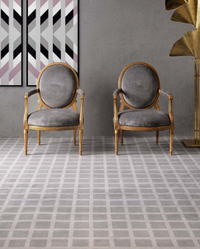 Living room view of Match grey geometric Axminster carpet by Greg Natale
