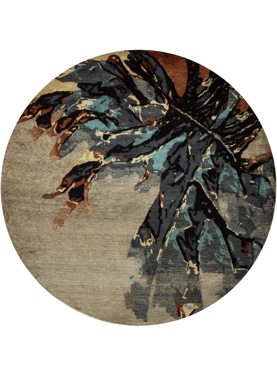 overhead image of the  Wings Round rug with a tree design in shades of brown, blue, and beige designed by Hare+klein