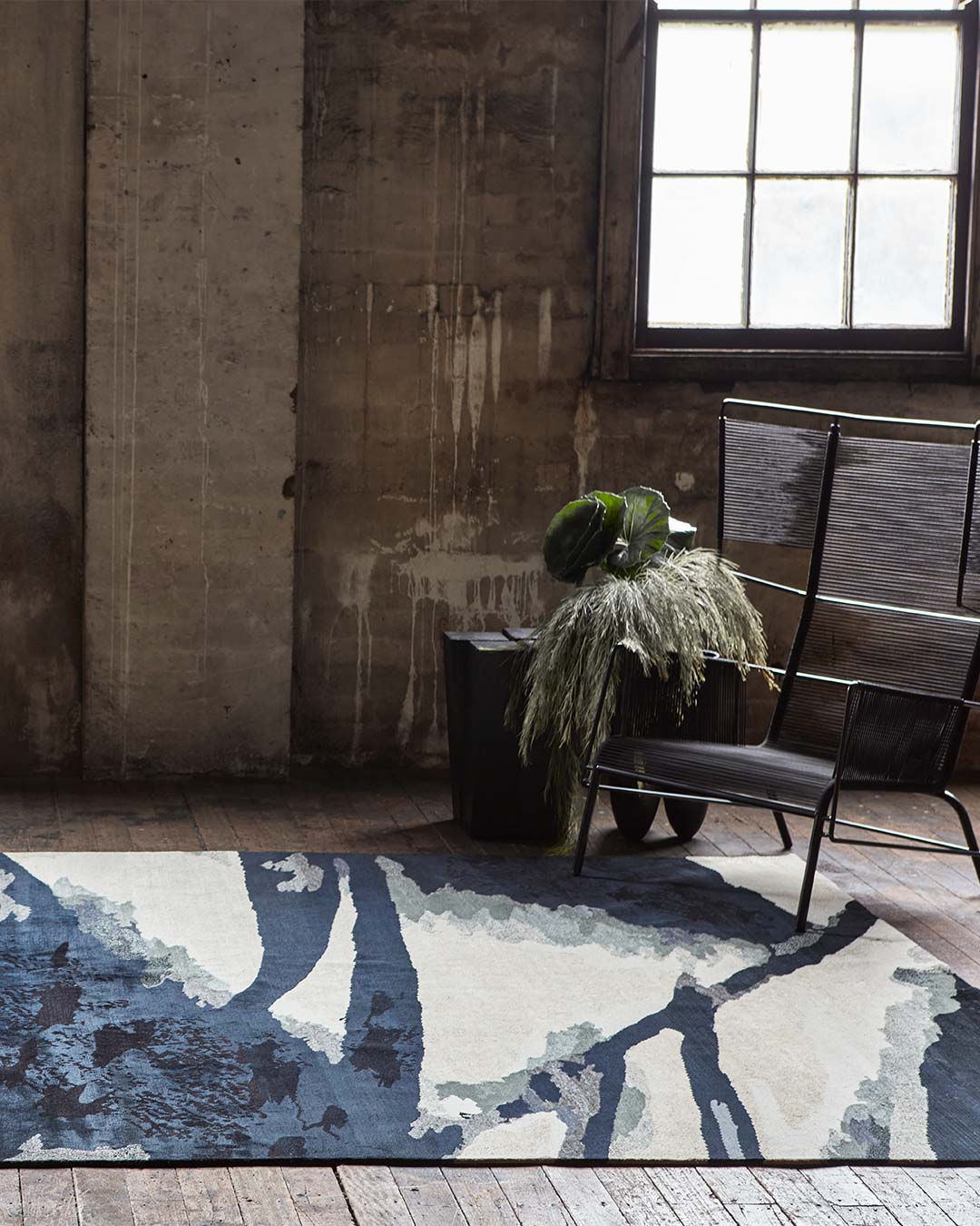 Styled image of painterly Canopy rug by Hare + Klein