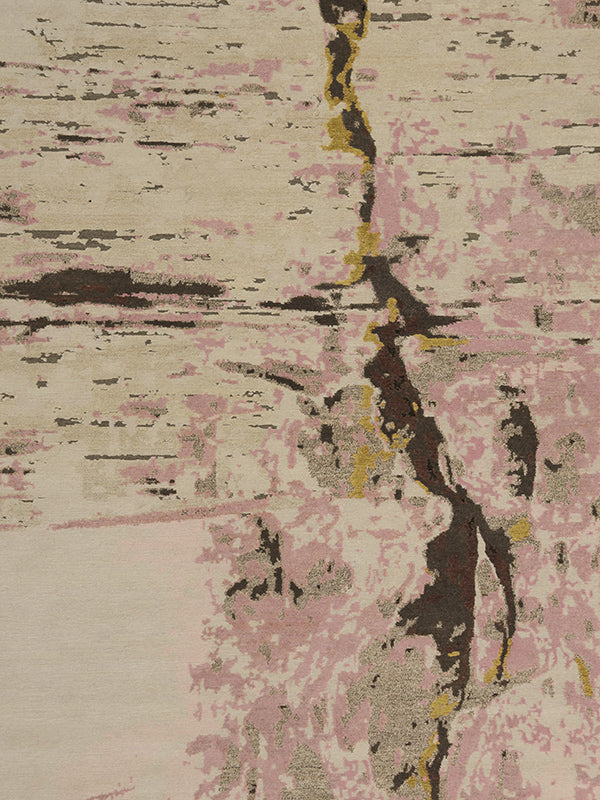 Overhead image of organic crevasse handknot rug by Hare and Klein in pink, gold and beige