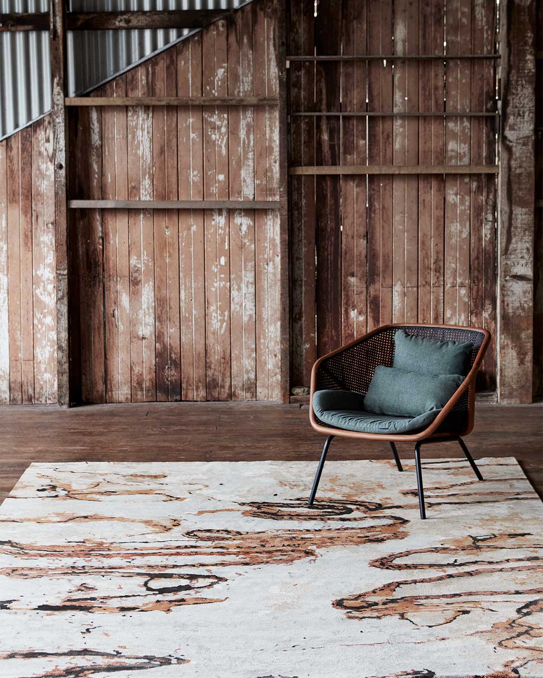 Styled image of Scribble brown rug by Hare + Klein