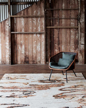 Styled image of Scribble brown rug by Hare + Klein