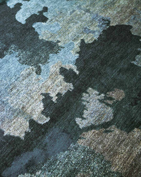 Detailed image of organic Shadows handknot rug by Hare and Klein in blue colour
