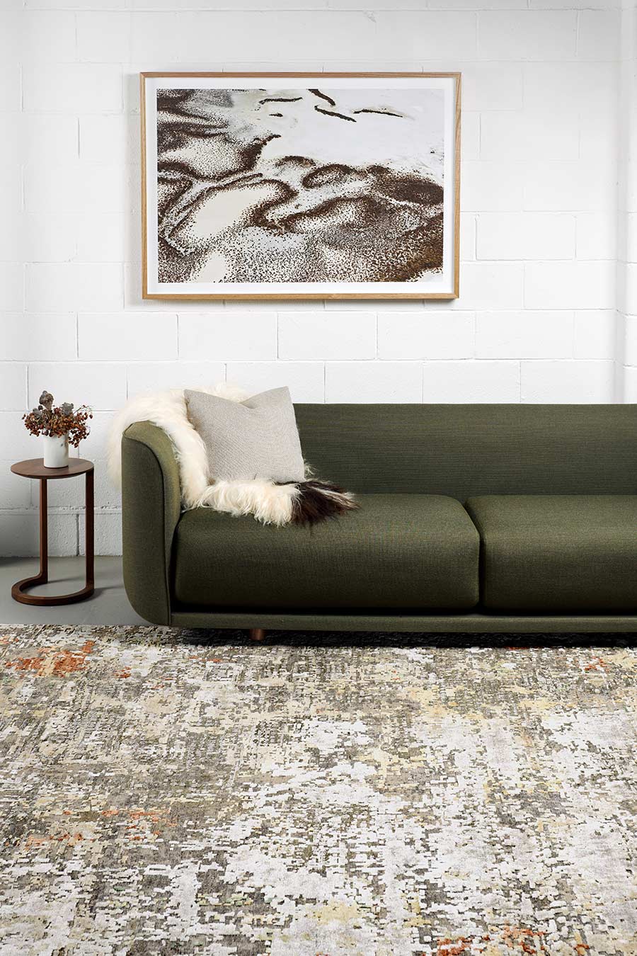 Living room view of charcoal Harissa rug in grey colour