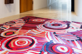 Overhead image of indigenous Celebration rug by Minnie Pwerle in pink colour