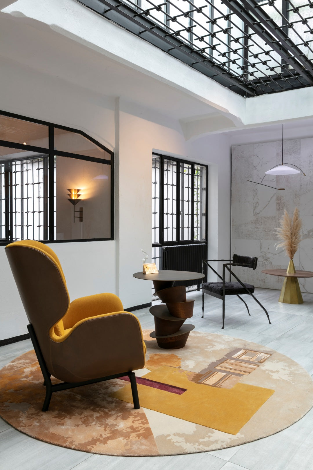 location shot of materiality 2 yellow round rug by emma elizabeth designs