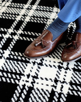 Close up view of Kintore black and white tartan Axminster carpet