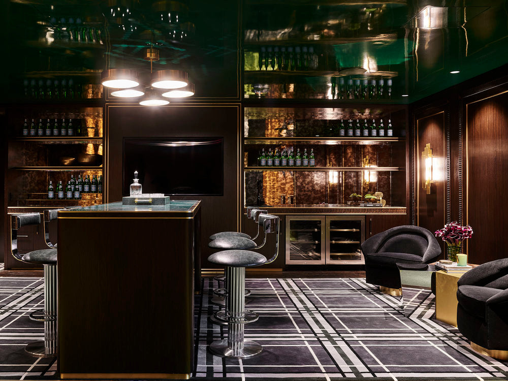 Hand tufted wall to wall carpet, brushstroke pattern in teal, bronze and stone on a dark ground