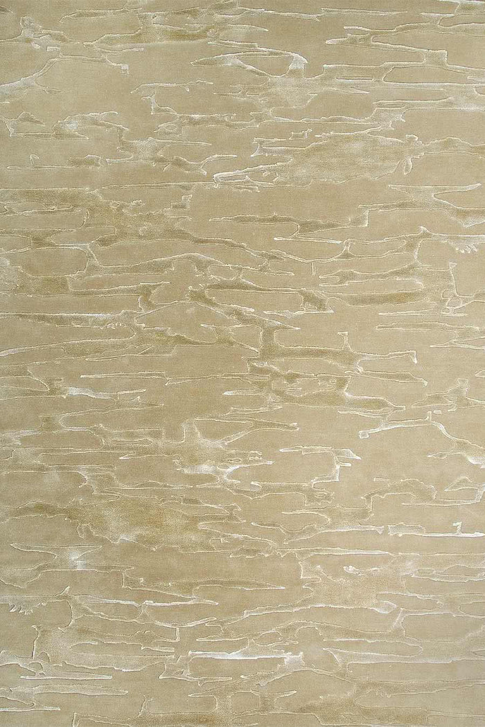 Overhead image of our organically patterned Rockface rug in beige
