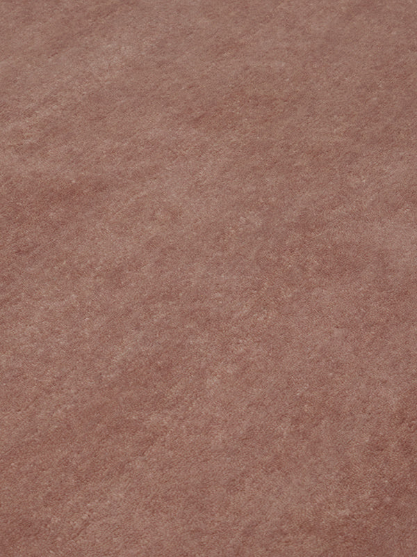 close up image of the Baked Clay texture rug