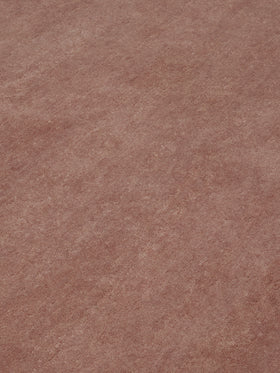 close up image of the Baked Clay texture rug