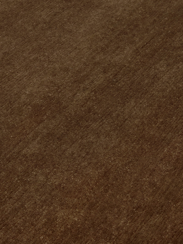 Close up image of the dark Bronze texture rug
