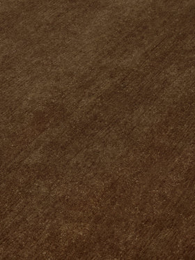Close up image of the dark Bronze texture rug