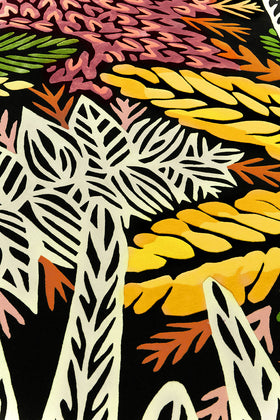 Close up image of round floral Complex Ecologies rug by Tamika Grant Iramu