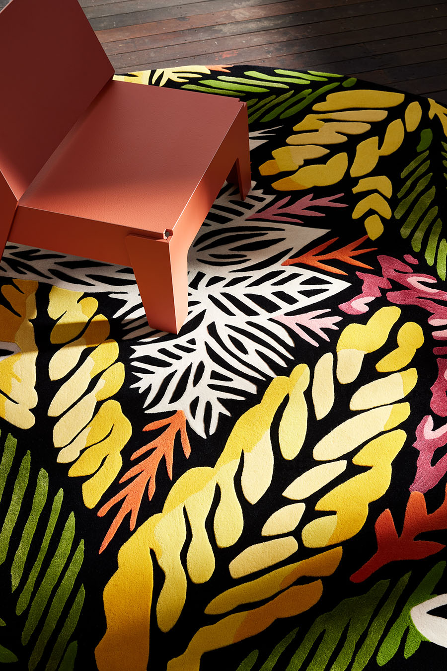 Styled close up image of round floral Complex Ecologies rug by Tamika Grant Iramu