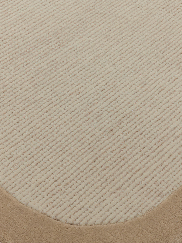 Close up image of the wolfram white salt rug with border