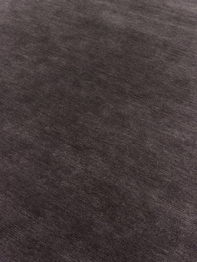 close up image of the summit black-plum rug