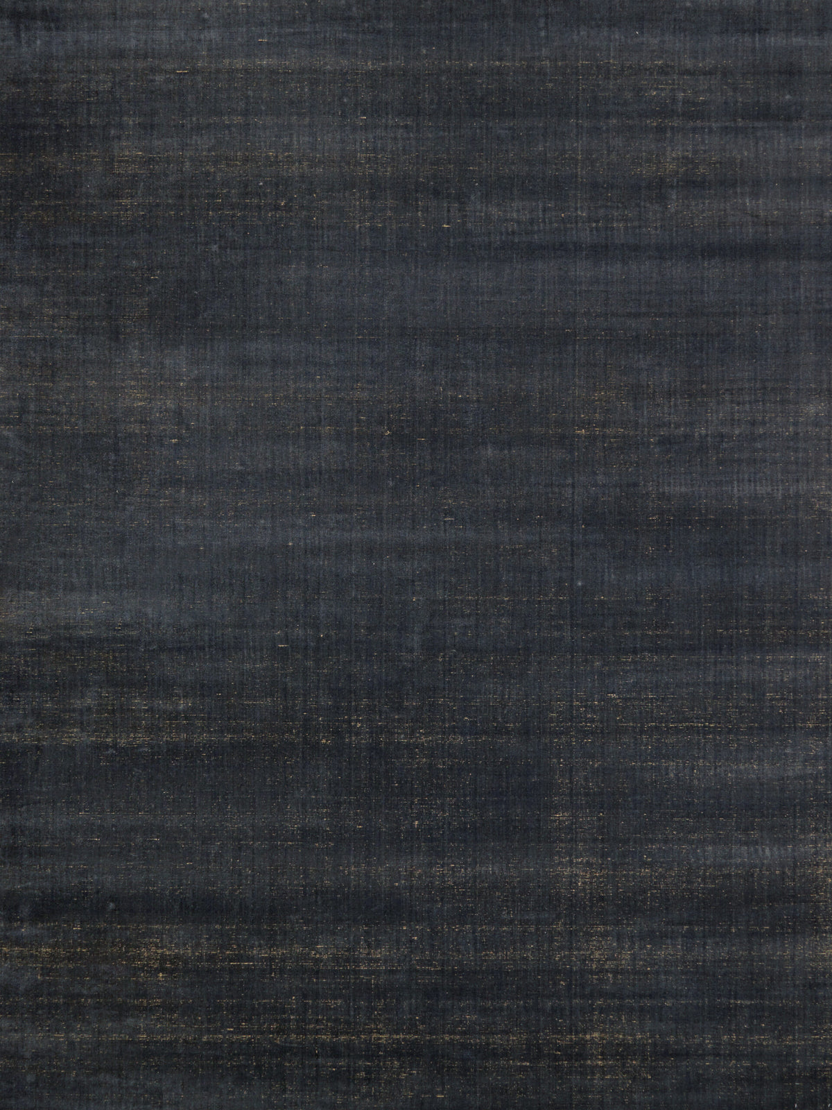 overhead image of the Ravira-charcoal-Honey rug