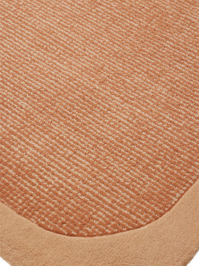 Close up image of the wolfram fudge rug with border